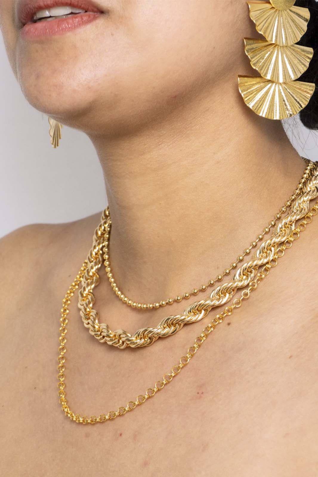 Set de arete abanico cascada en bronce y cadena trenzada en rodio